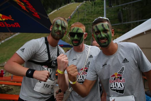 Masked and fun were those of these three runners at the Red Bull 400 - Germany premiere Titisee-Neustadt