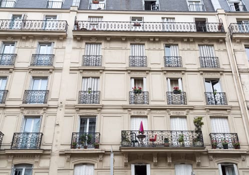 French Balconies in Paris with flowers.
