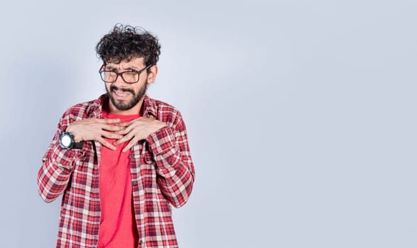 People with disgust face isolated. Handsome man with disgust expression, isolated background, Person with cringe expression with hands on his chest