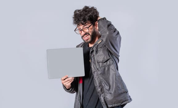 Young man with hand on head showing poster, man showing blank signboard isolated, guy showing signboard with blank space