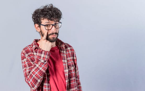 Distrustful man watching you, person with eyes on you, Distrustful guy with finger in the eye, distrustful man watching me