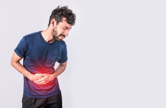 person with stomach pain, stomach problems concept, man with digestive problems, man with stomach pain, isolated