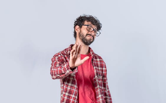 man rejecting with one hand, a man with rejection expression, isolated man with hand rejecting