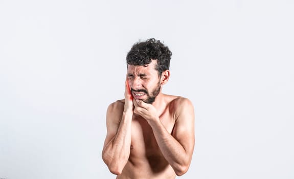 Person with earache on isolated background, man with earache on isolated background, ear disease concept