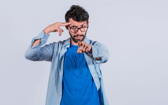 Annoyed angry man with finger pointing at camera, Bossy man pointing at camera, Face of angry man pointing at you