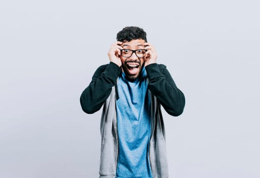 Surprised person opening his mouth, Surprised people with dumbfounded face on isolated background, astonished man holding his head