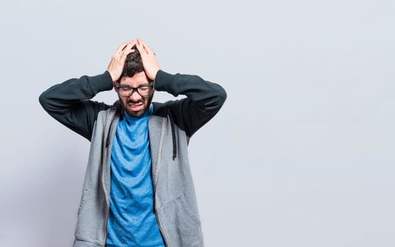 People rubbing his head on isolated background, Concept of a person with a headache, guy giving himself a head massage, concept of a man with a migraine