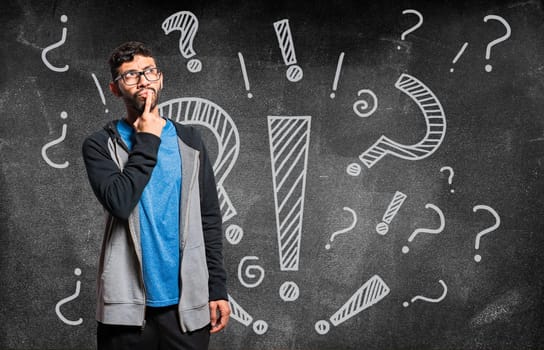 Thoughtful people looking up with exclamation marks, Thoughtful person with interrogation marks isolated, Indecisive people looking up, Concept of man asking with exclamation marks
