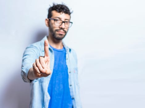 People finger counting the number one on an isolated background. Person hand counting number one, Hand of handsome guy showing number one