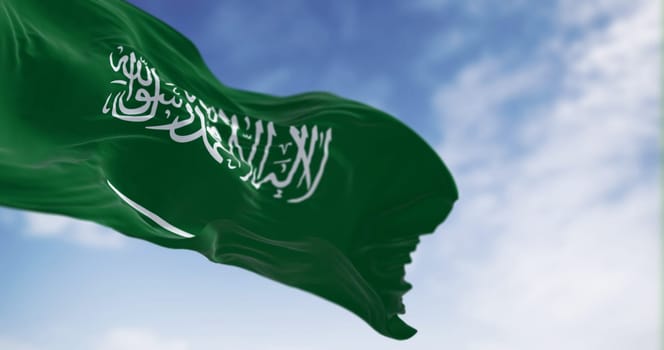 Saudi Arabia national flag waving in the wind on a clear day. Green field with Shahada and sword in Thuluth script. Fluttering fabric. 3d illustration render
