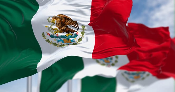Three Mexican national flags waving in the wind. vertical tricolor of green, white, and red with national coat of arms in the center of the white stripe. 3D illustration render. Rippled textile