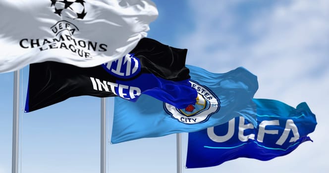 Istanbul, TR, May 2023: The flags of the Champions League, Inter Milan, Manchester City and UEFA waving. Inter Milan vs Man City in 2023 CL final. Illustrative editorial 3d illustration render