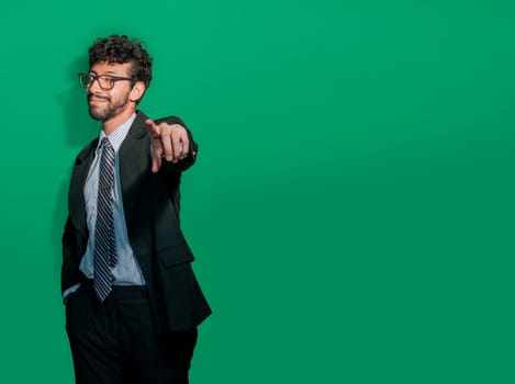 Young businessman with positive attitude pointing at me, Friendly smiling business man pointing at you, Positive business people pointing at camera
