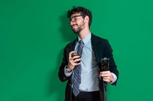 elegant businessman perfuming himself and combing his hair, Businessman painting and perfuming himself isolated