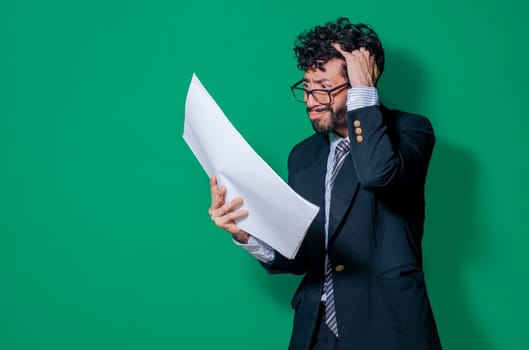 Confused businessman with documents in hand, Businessman puzzled with documents in hand isolated, Concept of man in formal suit frustrated with documents in hand