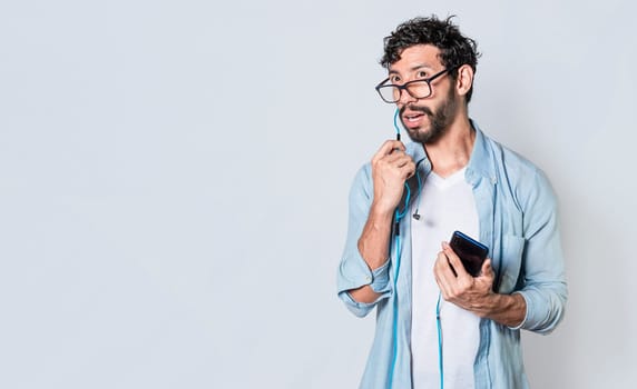 Person using handsfree on a cellphone call isolated, People on a call using handsfree. handsome man using handsfree while calling on cellphone