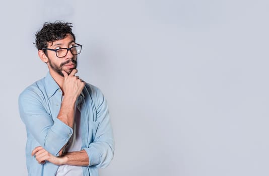 Person wondering with hand on chin looking aside isolated, People wondering with hand on chin seeing blank space, Concept of thoughtful person with hand on chin