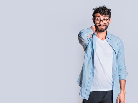 Person with uncomfortable face isolated on white background, Handsome man with uncomfortable expression isolated, Teenager with insecure expression