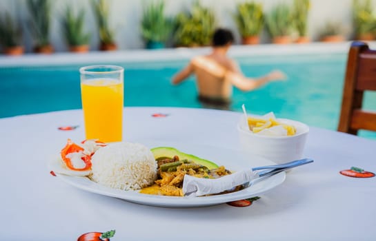 Traditional breakfast served poolside. Traditional morning breakfast near the swimming pool
