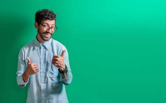 Friendly person making ok gesture, Man gesturing everything is ok, Smiling man making allright gesture and looking at camera, expression of everything is fine.