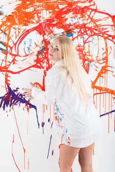 Young woman doing painting therapy