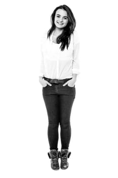 Full length of teen girl with hands in pockets