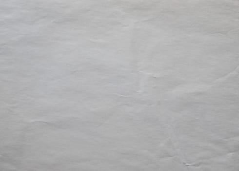 Paper texture background of off white crumpled paper sheet