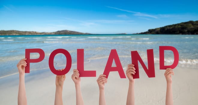 People Or Persons Hands Building English Word Poland. Summer Ocean, Sea And Beach As Background.