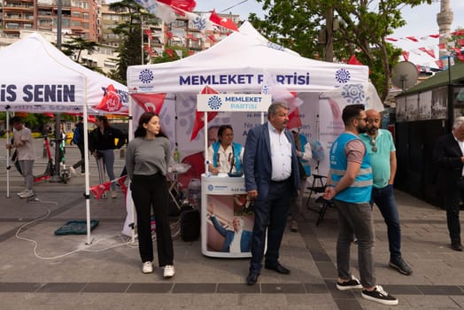 Istanbul, Turkey - May 3 2023: Memleket Party supporters in front of party tent in the neighbourhood of Uskudar during 2023 elections