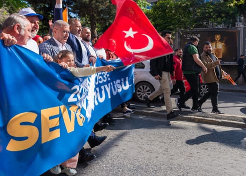 Istanbul, Turkey - May 13 2023: Street march of AK Party in Cumhuriyet street, Uskudar neighbourhood during 2023 elections