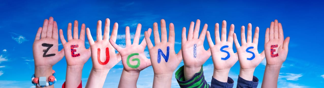 Children Hands Building Colorful German Word Zeugnisse Means School Reports. Blue Sky As Background.