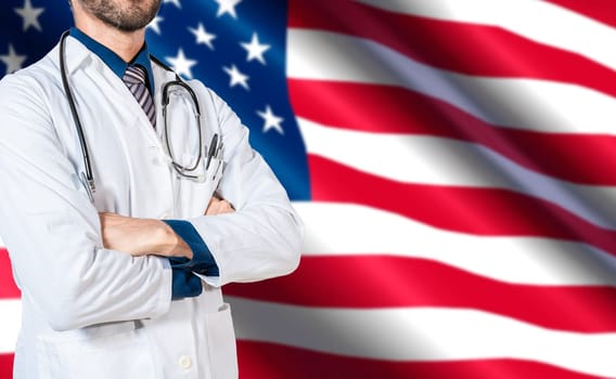 Health and care with the flag of United State. USA national health concept, Doctor with stethoscope on USA flag. Doctor arm holding stethoscope on USA flag