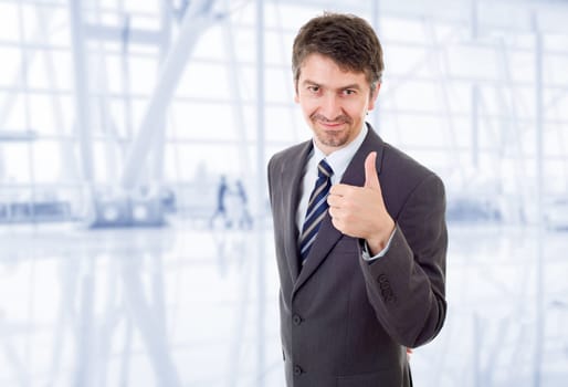 young business man going thumb up, at the office