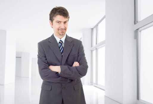 young business man portrait at the office