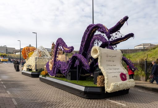 Noordwijk, Netherlands - April 22, 2023: Spectacular flower covered floats in the Bloemencorso Bollenstreek the annual spring flower parade from Noordwijk to Haarlem in the Netherlands.