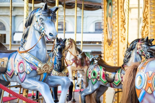 Florence, Italy - Circa March 2022: vintage carousel horse - antique attraction