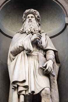 Leonardo da Vinci - Statue of the genius, located in front of Uffizi Gallery in Florence, Italy, public area