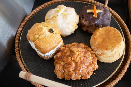 Variety of slices bakery arranged on table, stock photo