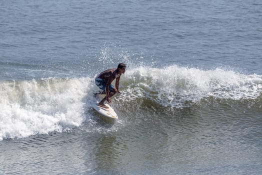 Surfers on the Caribbean coast of Costa Rica