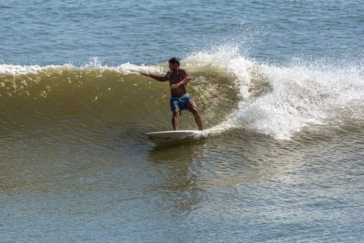 Surfers on the Caribbean coast of Costa Rica