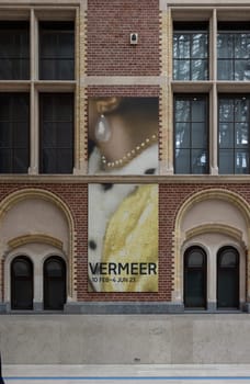 Amsterdam, Netherlands - April 21, 2023: The Rijksmuseum in Amsterdam - the largest exhibition on Dutch painter Johannes Vermeer ever - displaying 28 of his masterpieces