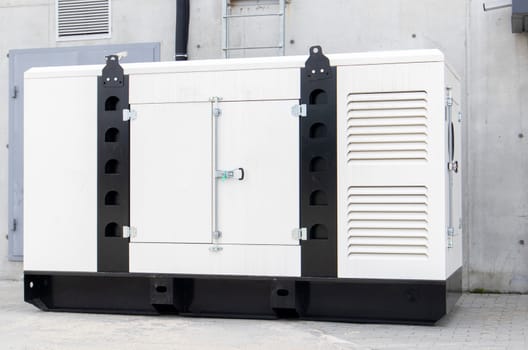 Mobile, standby industrial diesel generator for emergency power supply. Generator with internal combustion engine. For emergency use of electricity outdoors