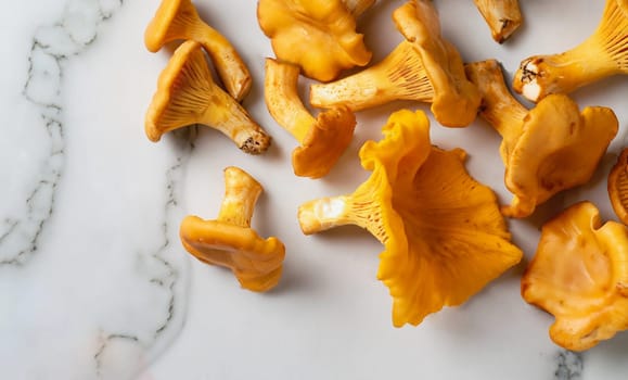 Forest Orange mushrooms chanterelles in a wicker basket and scattering on a white wooden table. Close up. Blur background