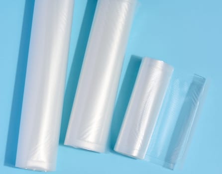 Rolls with plastic film for vacuum packaging of products, hermetic packaging for vegetables and meat