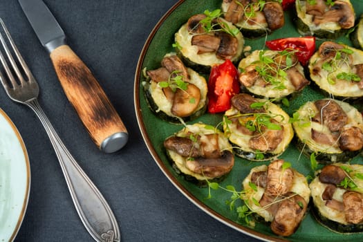 Diet food-fried zucchini with mushrooms and herbs. Roasted vegetables mix