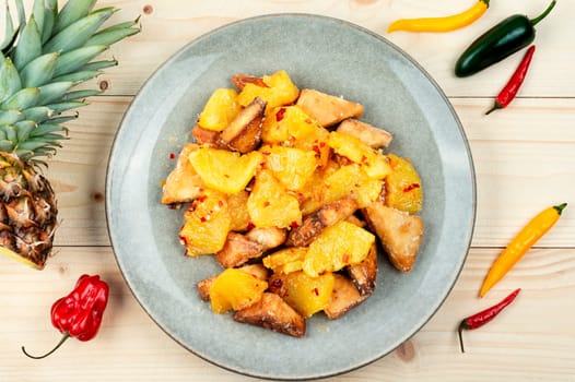 Tasty salad or tofu fried with pineapple. Traditional chinese dish