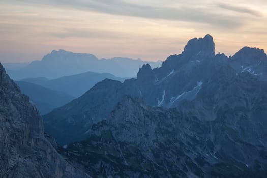 Sunset - Panorama of massive Alpine mountains. Landscape in the Austrian Alps of the Dachstein region (Styria in Austria)