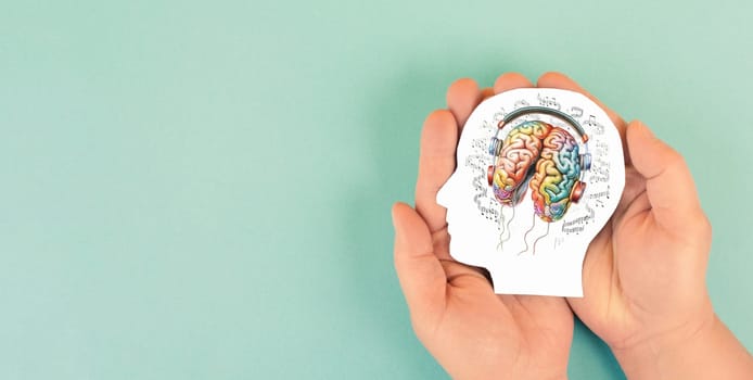 Human brain with headphones and music notes, social media, self care and mental health concept, sound therapy, creative mind, brain made with generative AI
