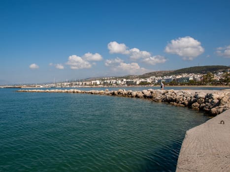 Rethymnon, Crete, Greece - June 16, 2022: Breakwater at the entrance to the port of Rethymnon, Crete, Greece