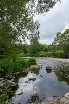 The Eder - A river in Germany in a green landscape